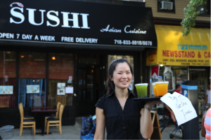 Chunmei Lin sells bubble tea in front of her own Japanese restaurant on Sept. 28, 2014.  (By Runze Yu)
